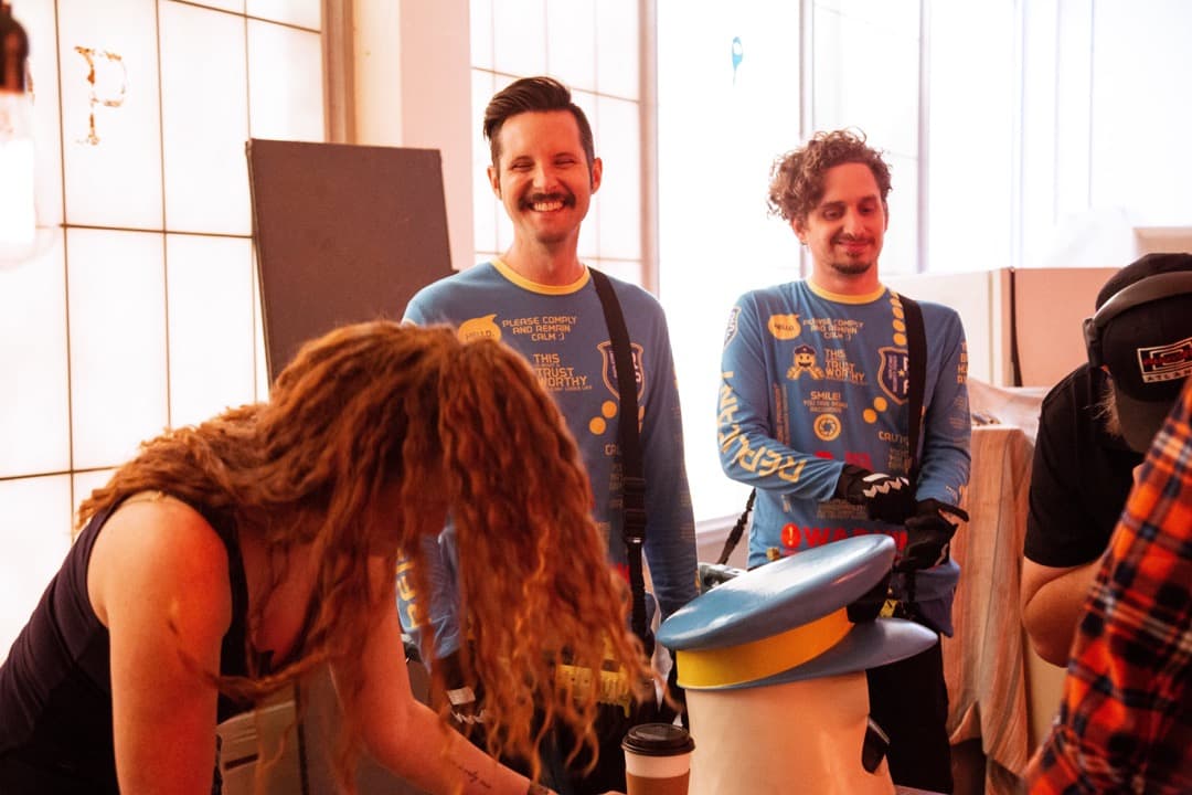 Behind the scenes photo 39 from Clone Cops production showing laura holloway, phillip cordell, and adam gowdy between shots